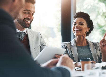 Diverse business men and woman talking