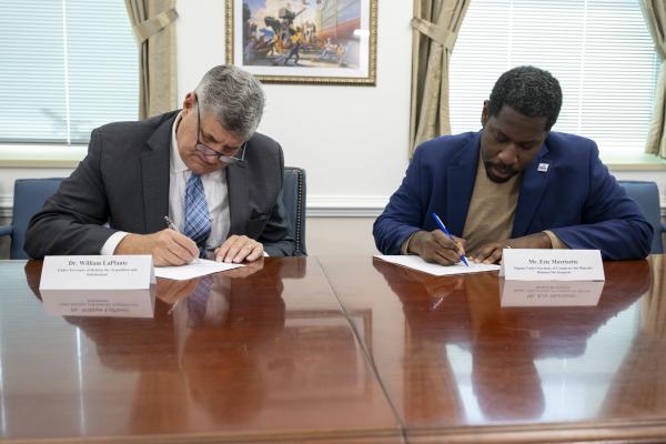 Deputy Under Secretary of Commerce for Minority Business Development Eric Morrissette and Under Secretary of Defense for Acquisition and Sustainment Dr. William LaPlante signing of their joint Memorandum of Understanding (MOU)