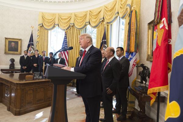 President Trump speaks in the Oval Office with MED Week Award Winners